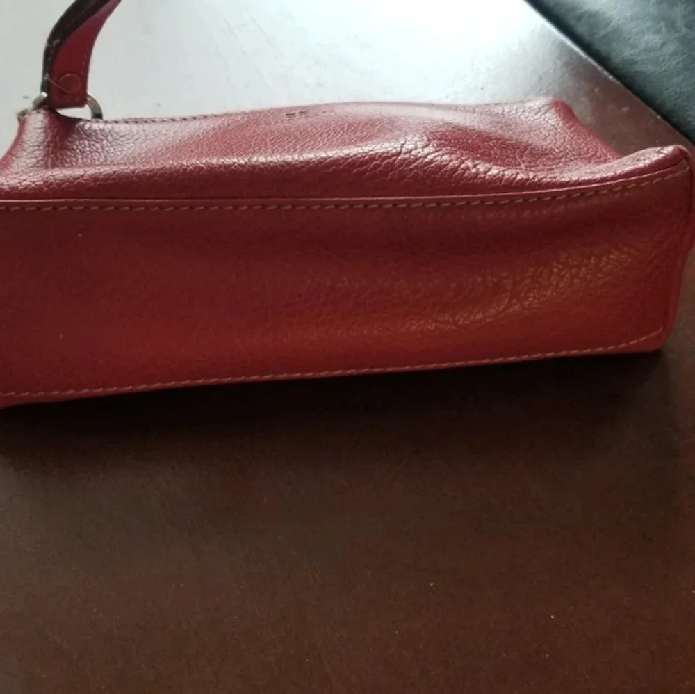 Kate Spade red pebbled leather wristlet bag